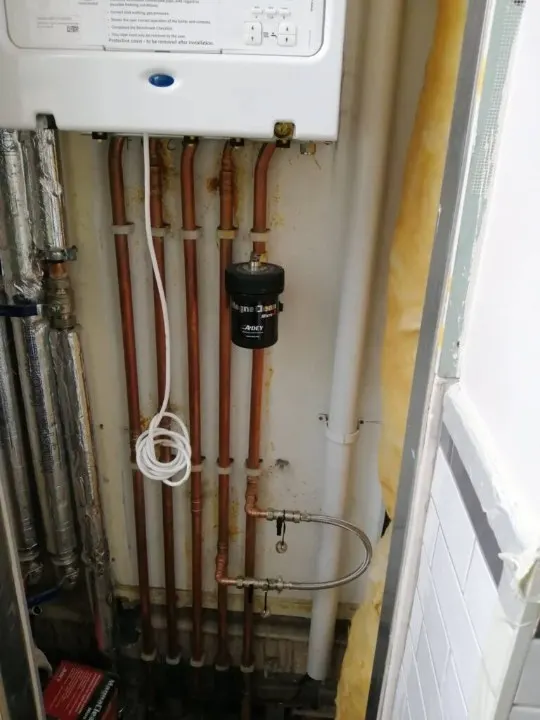 Boiler with copper pipe runs and a magnetic filter fitted